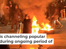 Iranians gather while blocking a street during a protest in Tehran on Jan. 9, 2026. MAHSA/Middle East Images/AFP via Getty Images